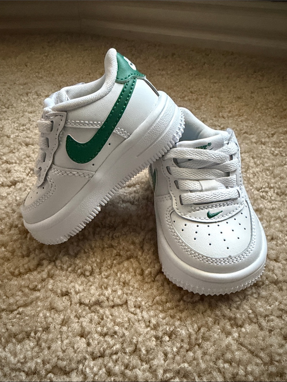 Nike Baby White Sneakers with Green Swoosh